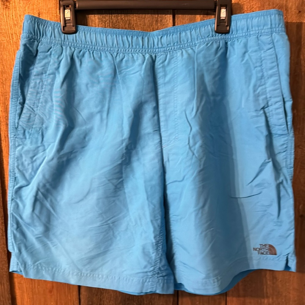 North Face blue swim trunks